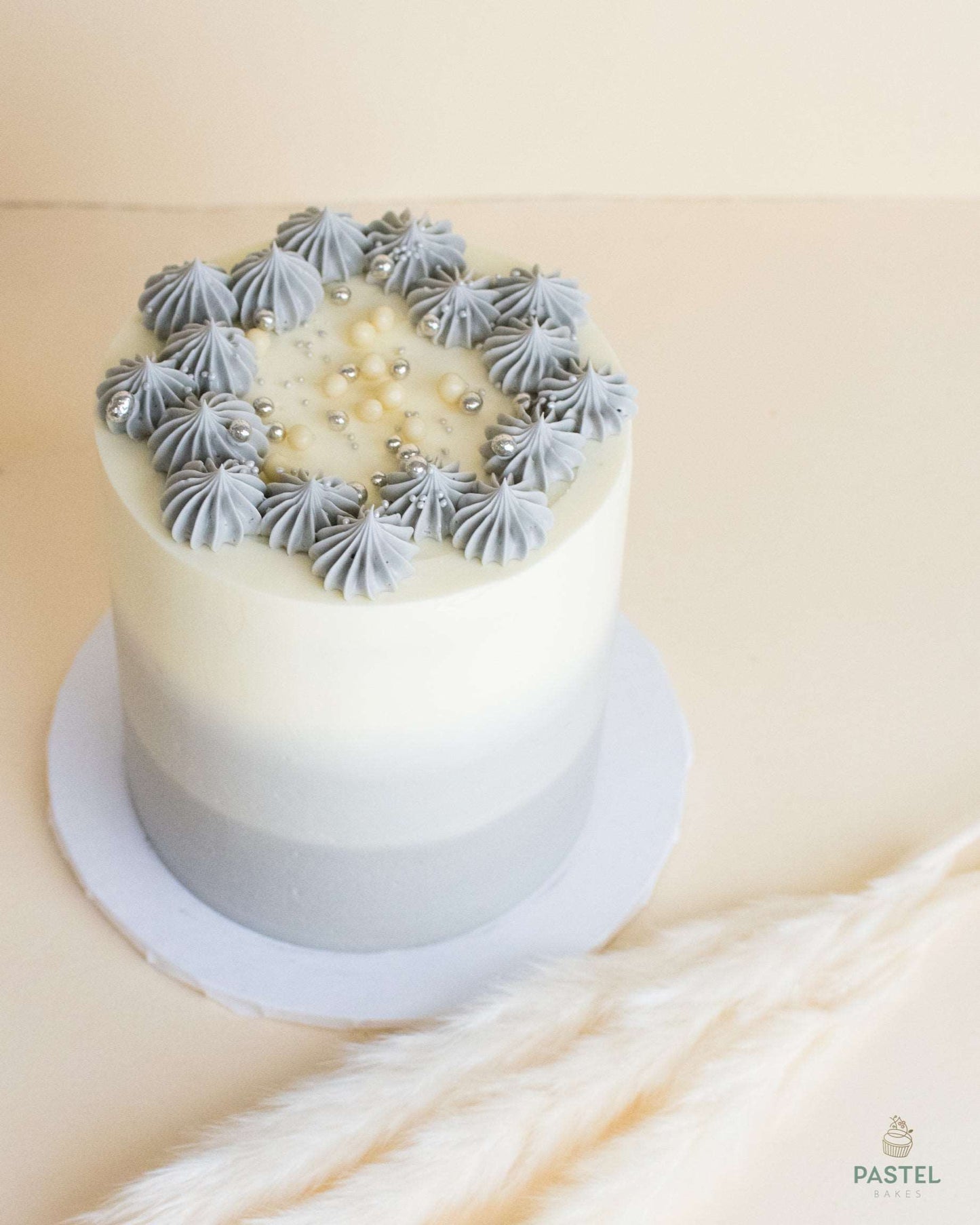 3 layers purple ombre cake with light purple decor